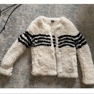 Fur jacket with black stripes